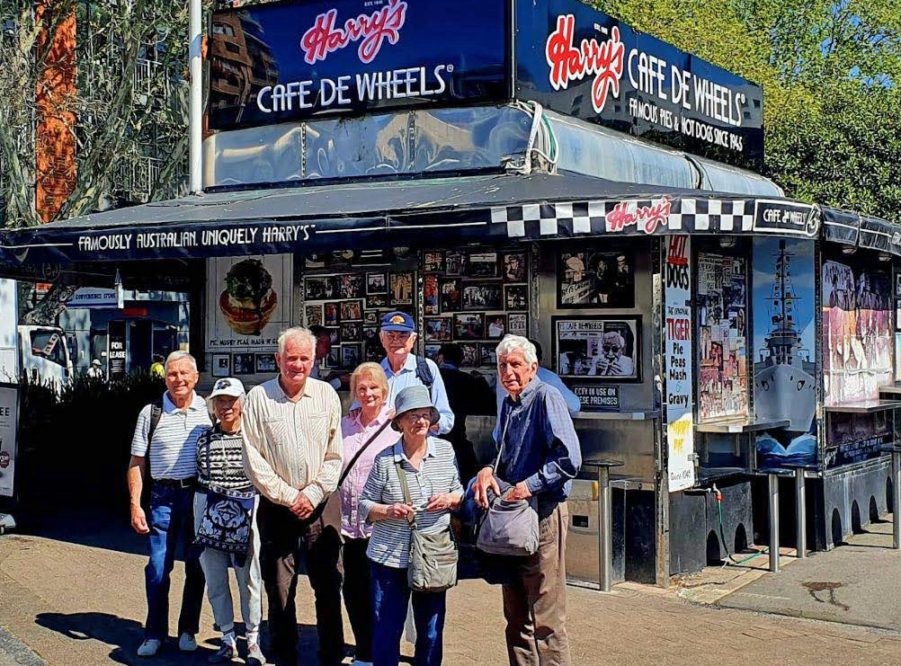group in front of Cafe de Wheels